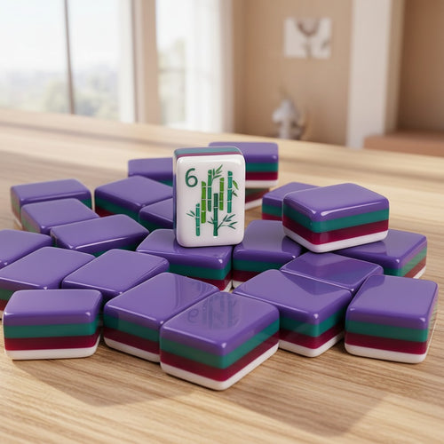 Pile of American mahjong tiles with a bold dark purple print design
