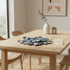 American mahjong tiles set in grey acrylic scattered on a modern wooden dining table in a bright room