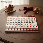 American mahjong tiles set with red Christmas festive engraved designs on a wooden table