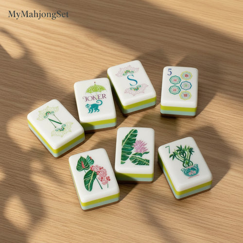 MyMahjongSet American Mahjong tiles with bamboo water pearl finish and colorful floral and joker designs on wood table.