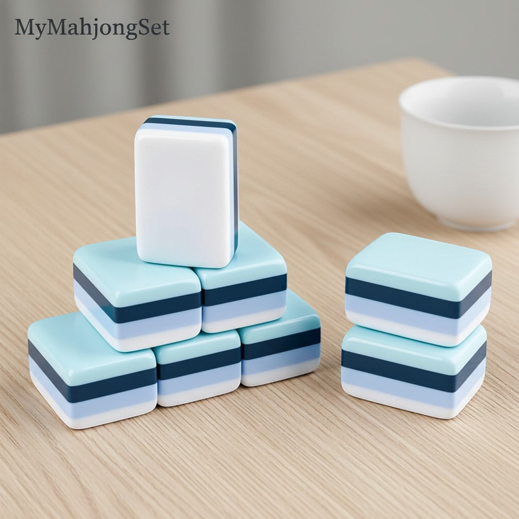 MyMahjongSet acrylic American mahjong tiles featuring a stacked blue and white striped design on a wooden table