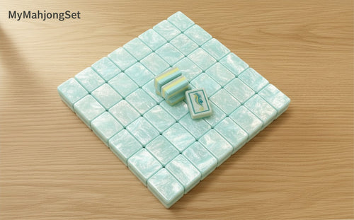 MyMahjongSet American Mahjong tiles with a CoralCoast water pearl finish in premium acrylic on a wooden table.