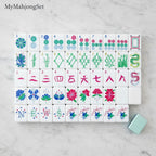 MyMahjongSet American mahjong tile set featuring green dragon engravings and vibrant floral patterns on white acrylic