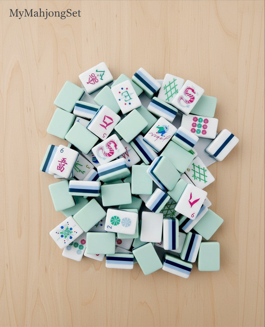 MyMahjongSet American mahjong tiles featuring green dragon engravings and colorful motifs on durable acrylic pieces.