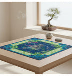 Navy blue American mahjong mat with a lime green border and a gold chinoiserie pagoda landscape design