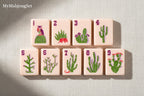 MyMahjongSet luxury pink acrylic mahjong tiles featuring detailed western cowboy and desert cactus illustrations