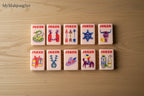 MyMahjongSet pink acrylic American mahjong tiles featuring Western cowboy and ranch-themed Joker designs