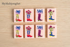 MyMahjongSet pink acrylic mahjong tiles featuring colorful cowboy boot and floral designs for a western ranch theme.