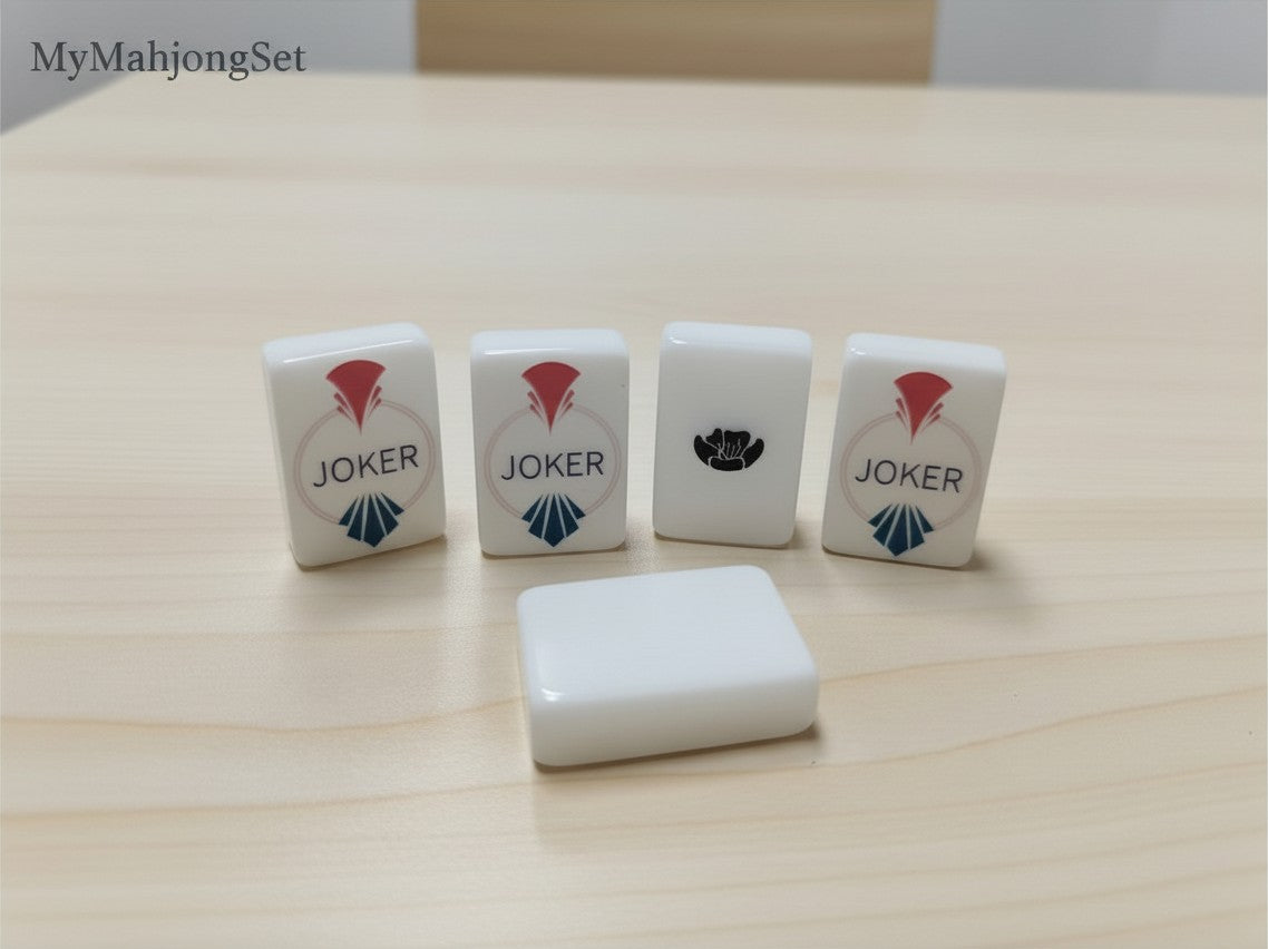 MyMahjongSet white pearl acrylic American mahjong tiles featuring Joker and flower designs on a wooden table