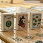 American mahjong tiles standing upright showing dragon tile illustrations in an elegant ivory finish