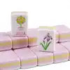 Pale purple American Mahjong tiles with elegant floral artwork, featuring premium acrylic construction and a soft pastel design for a stylish American Mahjong set.